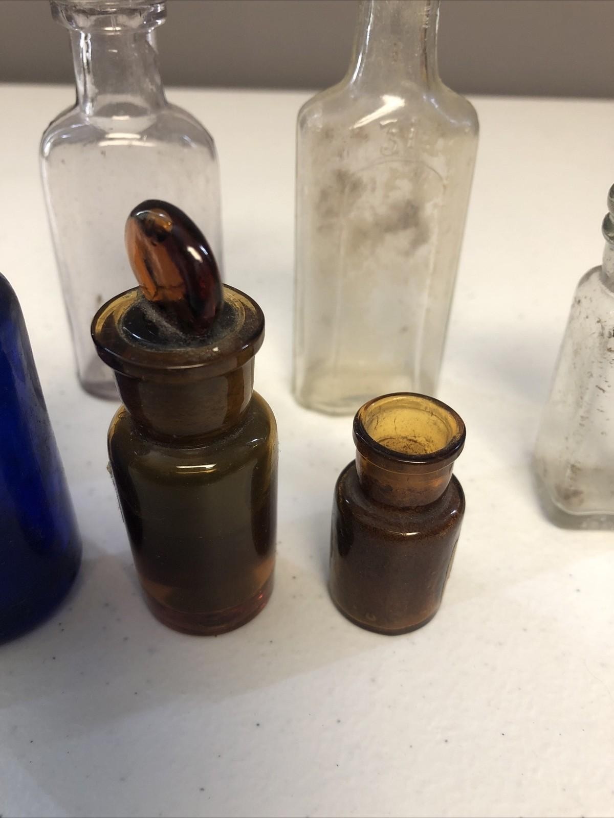 BROWN VINTAGE/ANTIQUE APOTHECRACY GLASS BOTTLES lot of 7