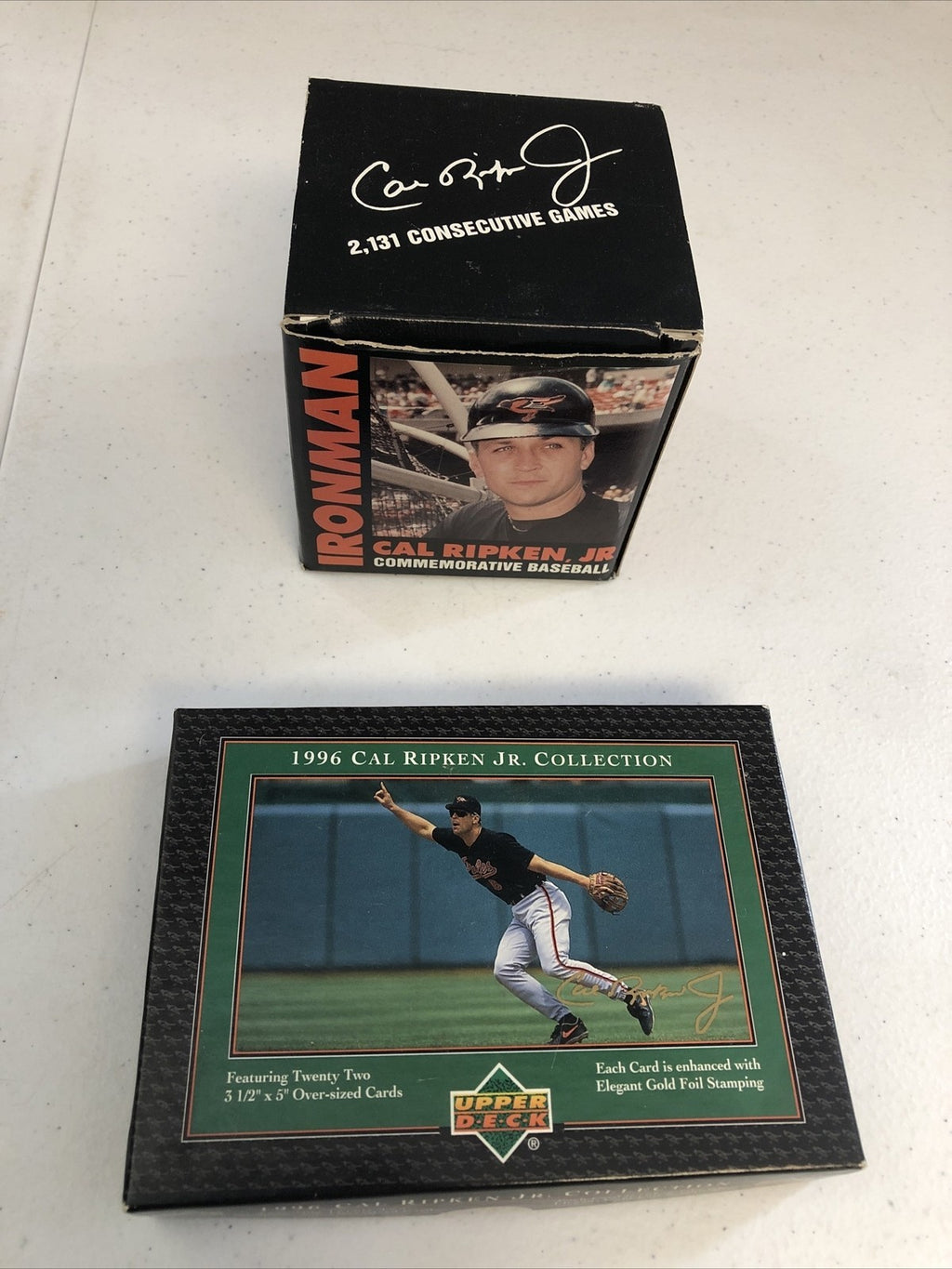 CAL RIPKEN JR COMMEMORATIVE AUTOGRAPHED BASEBALL(FASC) & 96 UPPER DECK SET