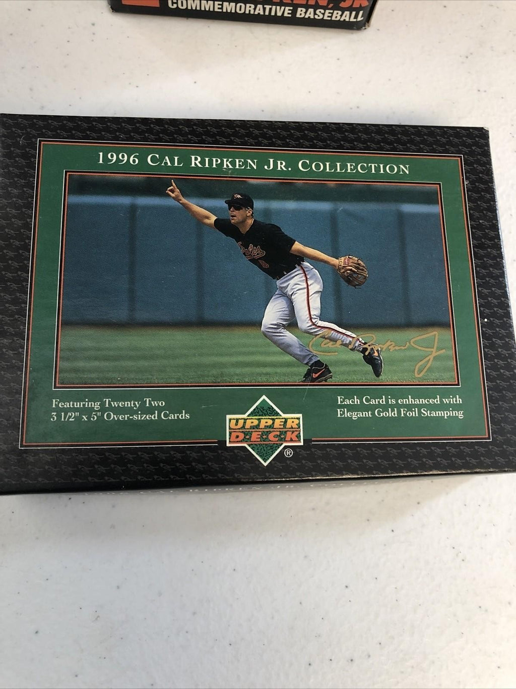 CAL RIPKEN JR COMMEMORATIVE AUTOGRAPHED BASEBALL(FASC) & 96 UPPER DECK SET
