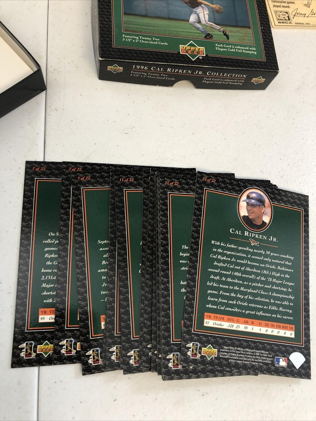 CAL RIPKEN JR COMMEMORATIVE AUTOGRAPHED BASEBALL(FASC) & 96 UPPER DECK SET