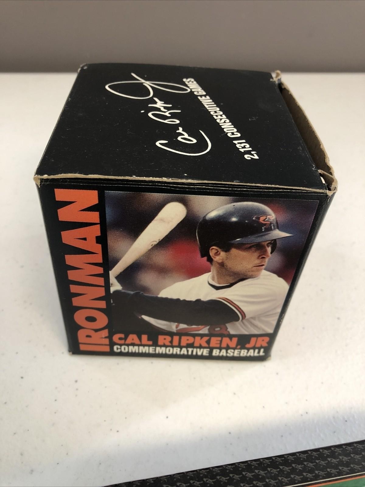 CAL RIPKEN JR COMMEMORATIVE AUTOGRAPHED BASEBALL(FASC) & 96 UPPER DECK SET