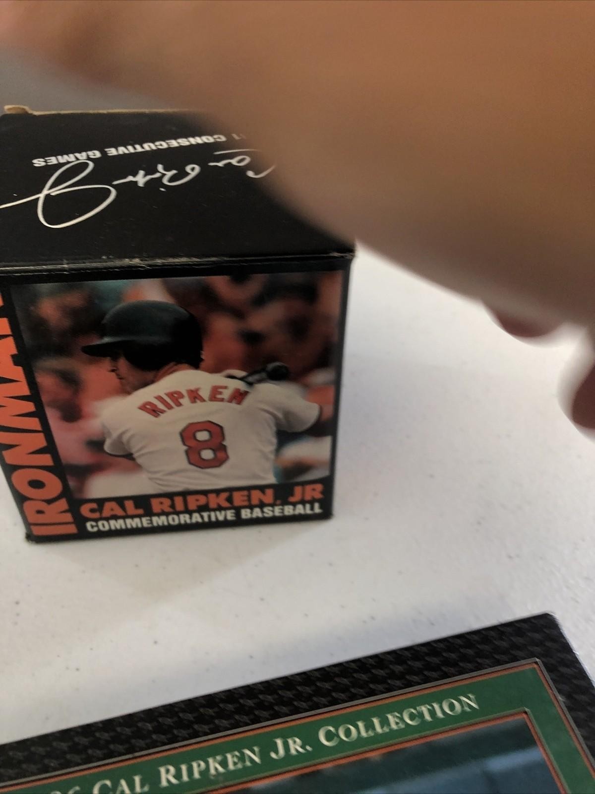CAL RIPKEN JR COMMEMORATIVE AUTOGRAPHED BASEBALL(FASC) & 96 UPPER DECK SET