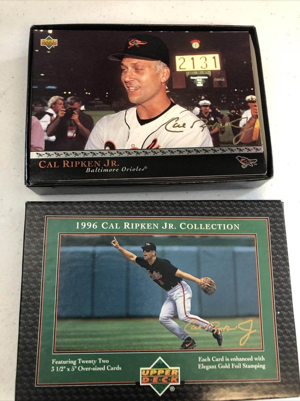 CAL RIPKEN JR COMMEMORATIVE AUTOGRAPHED BASEBALL(FASC) & 96 UPPER DECK SET