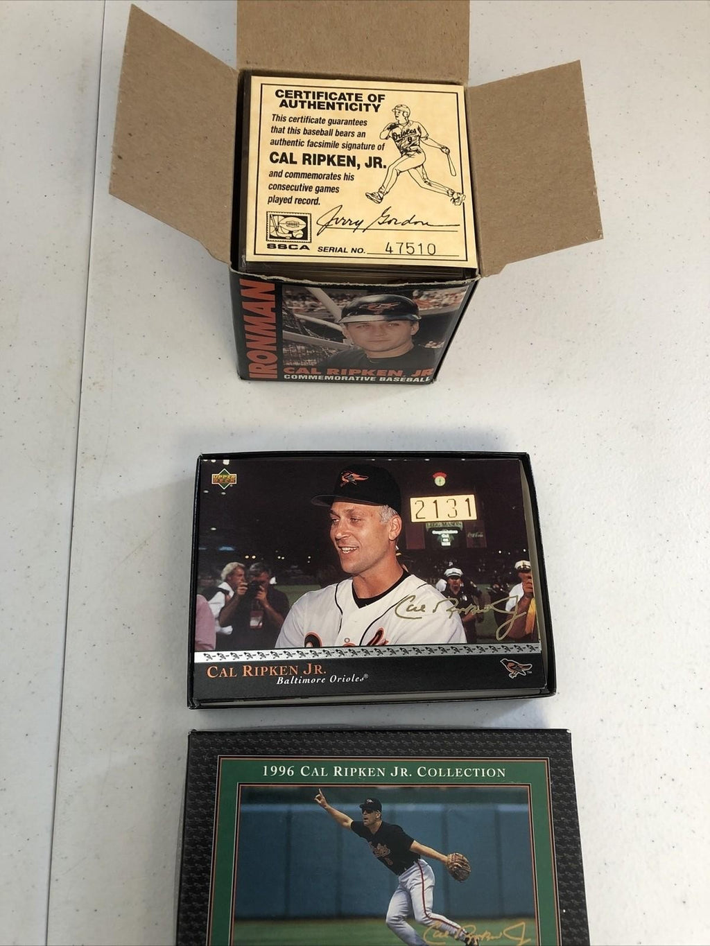 CAL RIPKEN JR COMMEMORATIVE AUTOGRAPHED BASEBALL(FASC) & 96 UPPER DECK SET