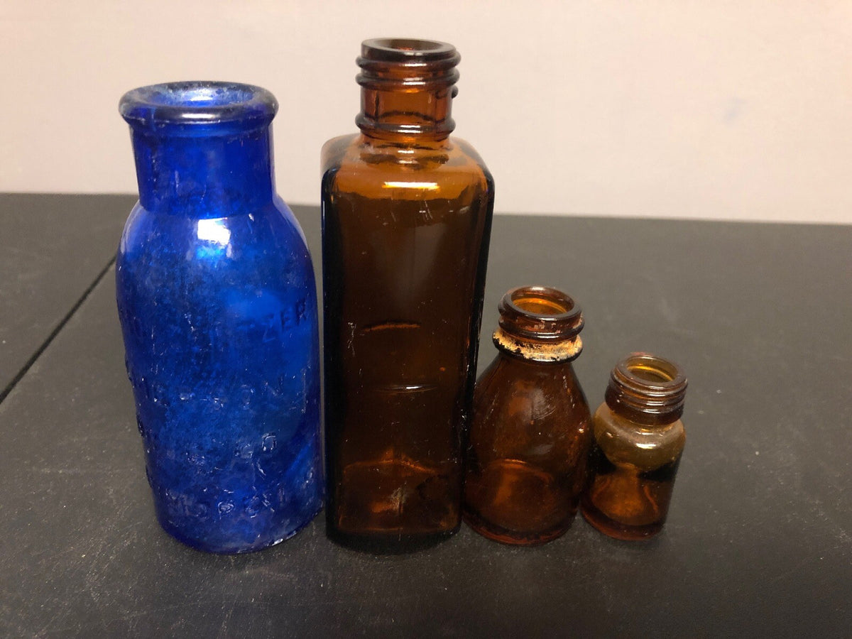 ANTIQUE BOTTLES  1- COBALT BROMO SELTZER BOTTLE & 3 BROWN ALCHEMY