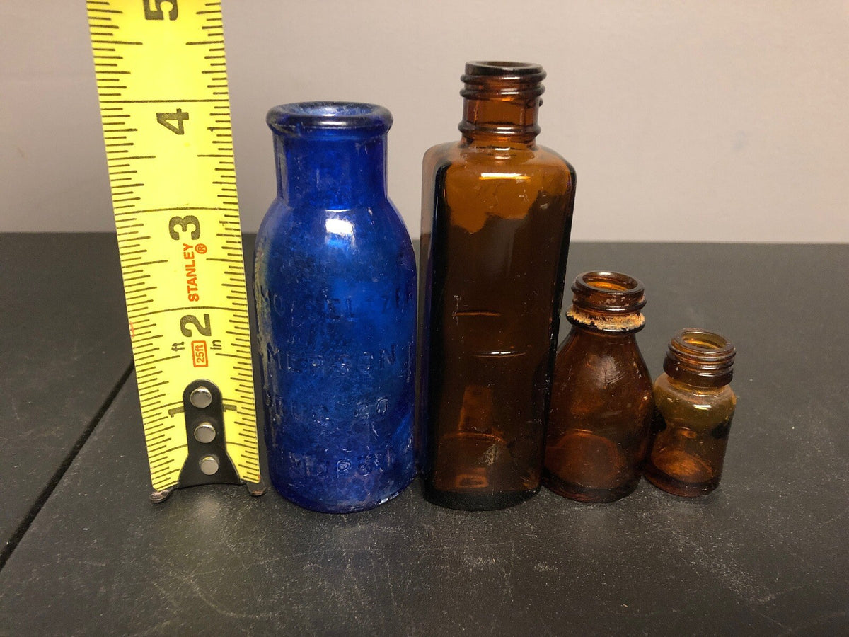 ANTIQUE BOTTLES  1- COBALT BROMO SELTZER BOTTLE & 3 BROWN ALCHEMY