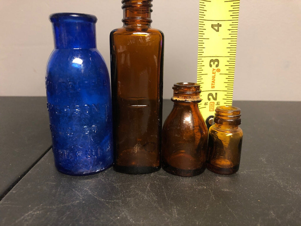 ANTIQUE BOTTLES  1- COBALT BROMO SELTZER BOTTLE & 3 BROWN ALCHEMY
