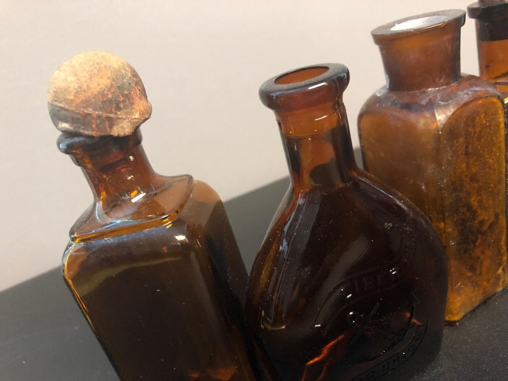 ANTIQUE BROWN BOTTLES, 1 WITH ORIGINAL DABBER, 1 WITH CORK